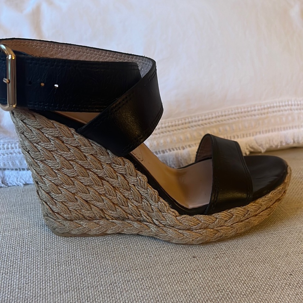 Stuart Weitzman black cross-strap wedges